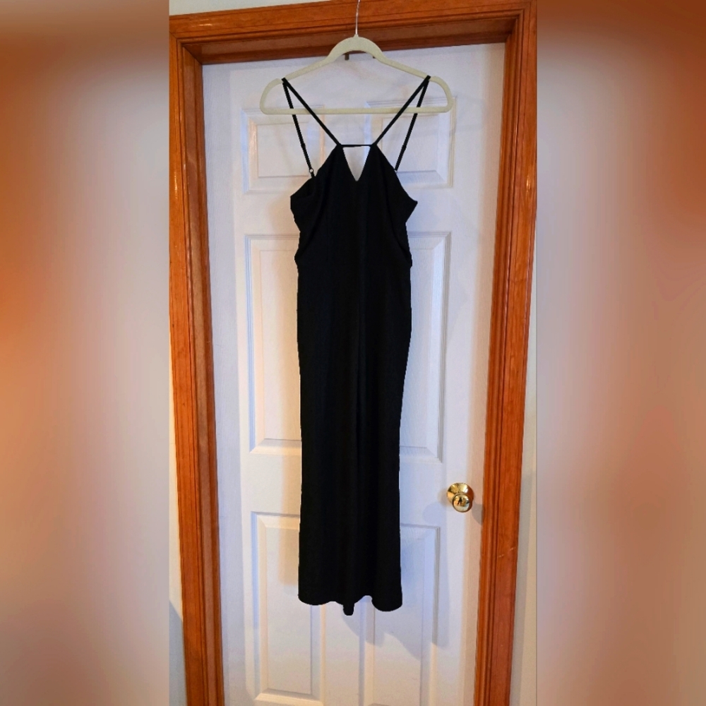 Wide legged, cropped jumper sleeveless w/ adjustable skinny straps and pockets